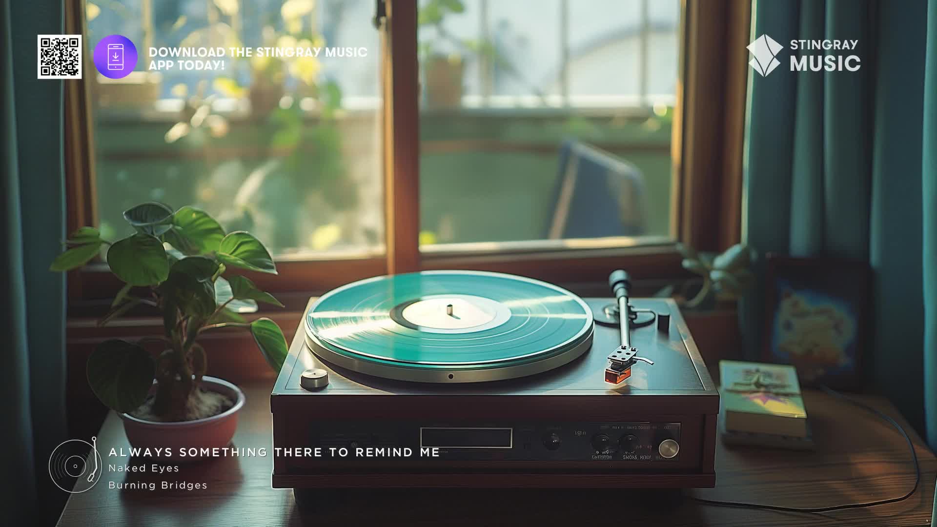 A turntable spins a teal-colored record, its needle resting gently in the groove. Outside, a window offers a glimpse of a Canadian landscape, and the Stingray Music logo is visible.
