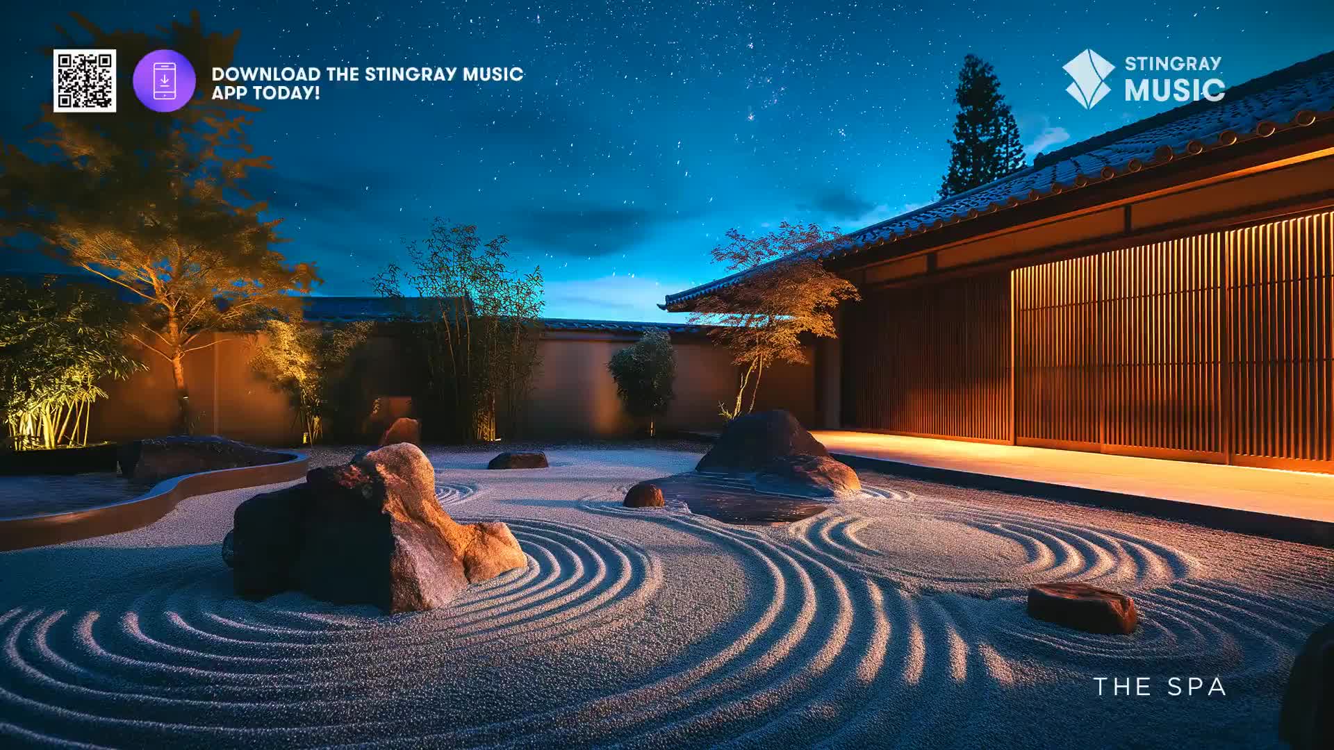 The raked sand of the zen garden ripples under soft lights, a serene scene at The Spa. Above, the night sky is a deep blue, dotted with distant stars.