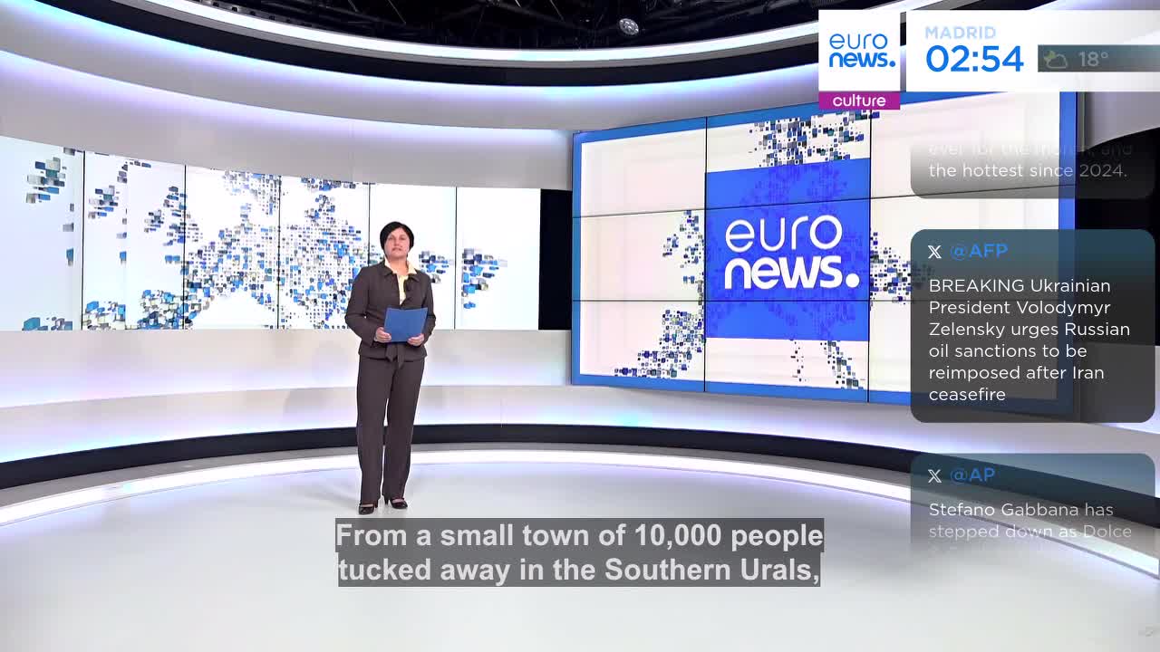 A woman in a dark suit stands in a studio, holding a blue folder. Behind her, screens display the Euronews logo and a map of Europe. Text overlays announce breaking news from AFP and AP.
