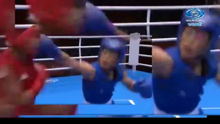 A boxer in red lunges forward, his glove a blur.  Another fighter, in blue, ducks and throws a punch, his face set in concentration.