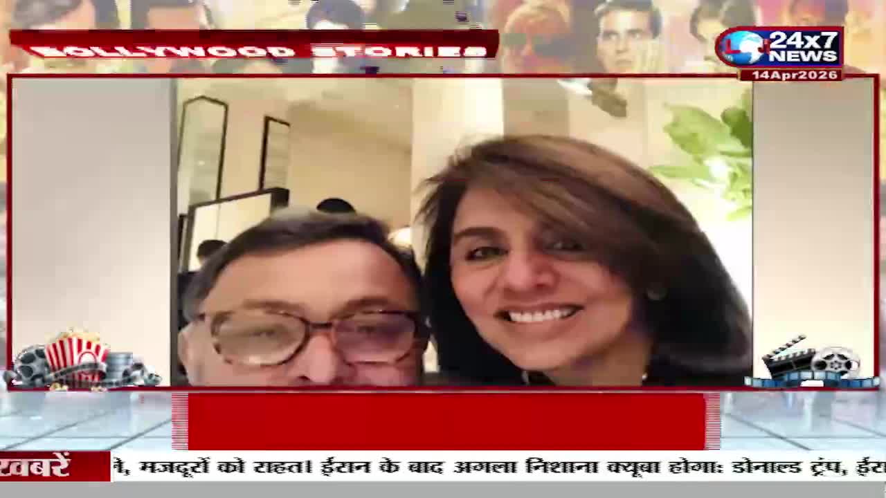 A man with glasses and a woman with dark hair smile at the camera. The 24x7 News logo and "Bollywood Stories" text appear on screen.