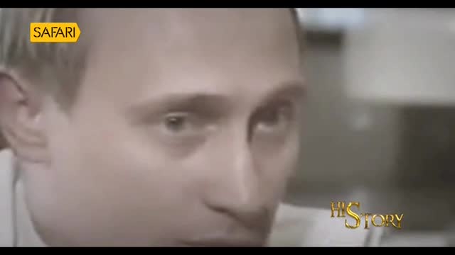 The camera focuses on a man's face, his eyes looking directly ahead. A yellow "Safari" logo appears in the top left corner, and a stylized "Hi Story" graphic is visible on the right.