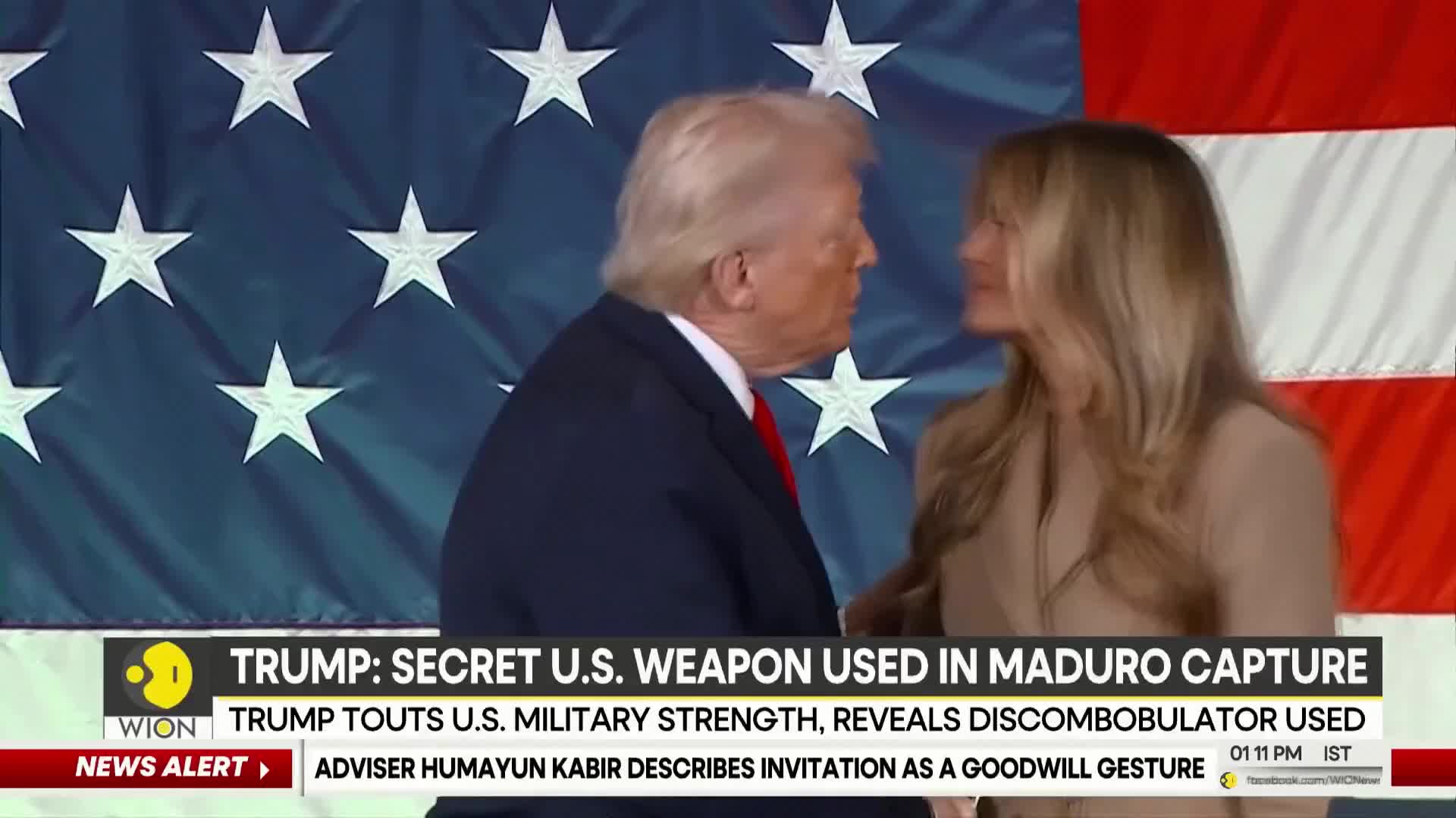 Donald Trump leans in towards a woman, his hand touching her arm, against a backdrop of the American flag. A WION news ticker scrolls below, mentioning "TRUMP: SECRET U.S. WEAPON USED IN MADURO CAPTURE."