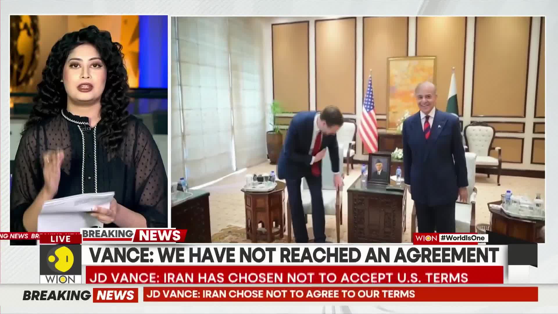 A man in a suit bows his head while another stands smiling, both in a room with flags and official portraits. The WION news chyron indicates a breakdown in negotiations.
