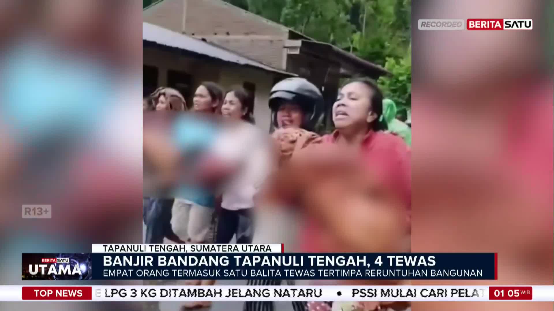 A group of women stand together, some with their mouths open, looking distressed. The BeritaSatu English broadcast shows a headline about a flash flood in Tapanuli Tengah, Sumatra Utara, where four people died.
