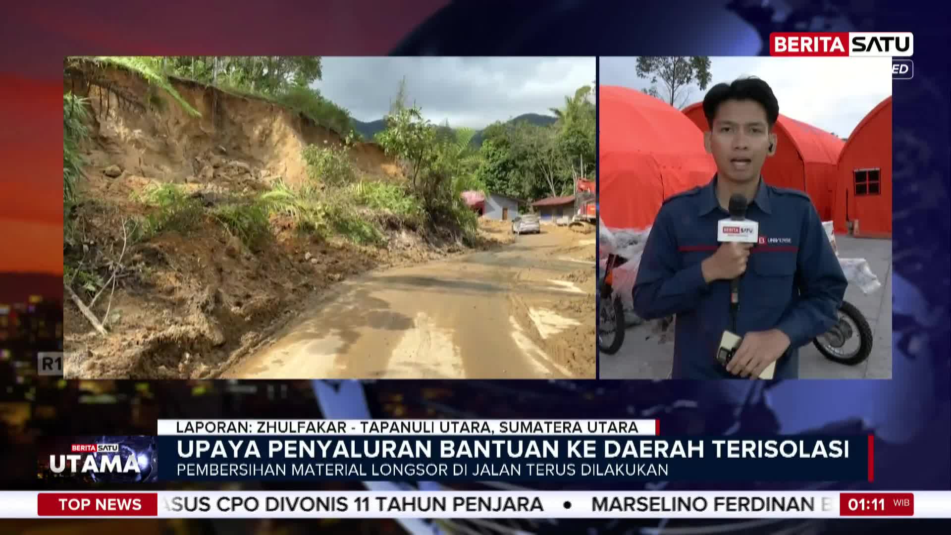 Mud and debris cover the road in Sumatra Utara, Indonesia, after a landslide. A reporter from BeritaSatu English stands near emergency tents, reporting on aid efforts.
