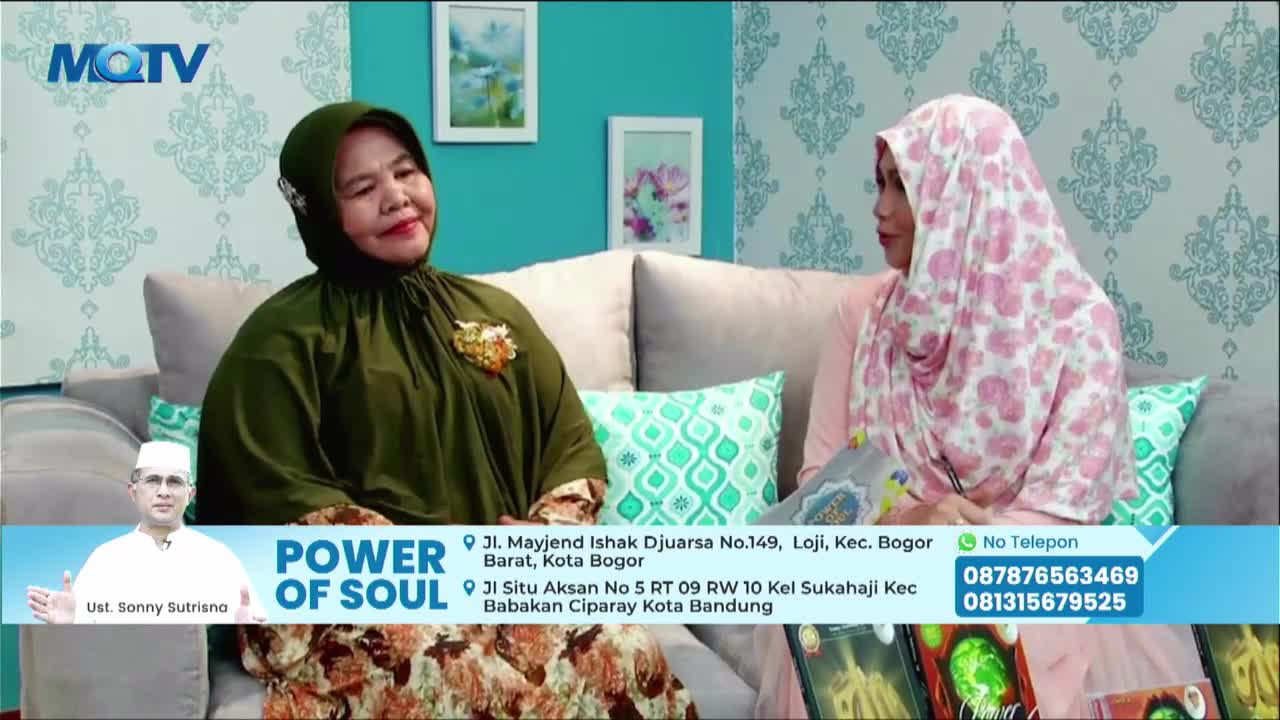 Two women in headscarves are seated on a couch, talking on what appears to be an MQTV program. The bottom of the screen displays a graphic for "Power of Soul" along with contact information.
Two women in headscarves are seated on a couch, talking on what appears to be an MQTV program. The bottom of the screen displays a graphic for "Power of Soul" along with contact information.
