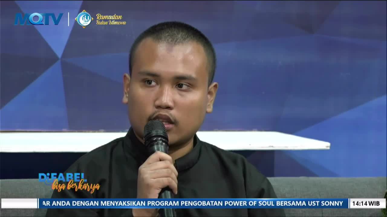 A young man in a black shirt speaks into a microphone on a television program. The MQTV logo and "Ramadan Bulan Istimewa" text appear in the upper corner.
