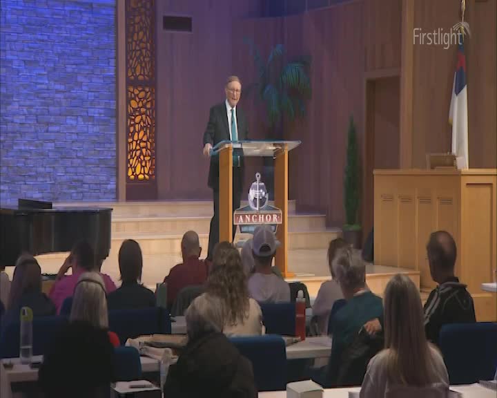 A man in a suit stands at a podium, speaking to a seated congregation. The room is lit by a soft, early morning glow, suggesting the start of a new day. A man in a suit stands at a podium, speaking to a seated congregation. The room is lit by a soft, early morning glow, suggesting the start of a new day.