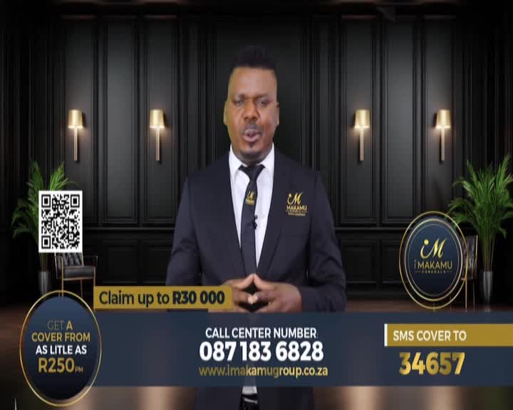 A man in a suit stands before a dark, paneled wall with two sconces. Below him, a graphic displays contact information for Makamu Funeral Services, including a call center number and an SMS code.