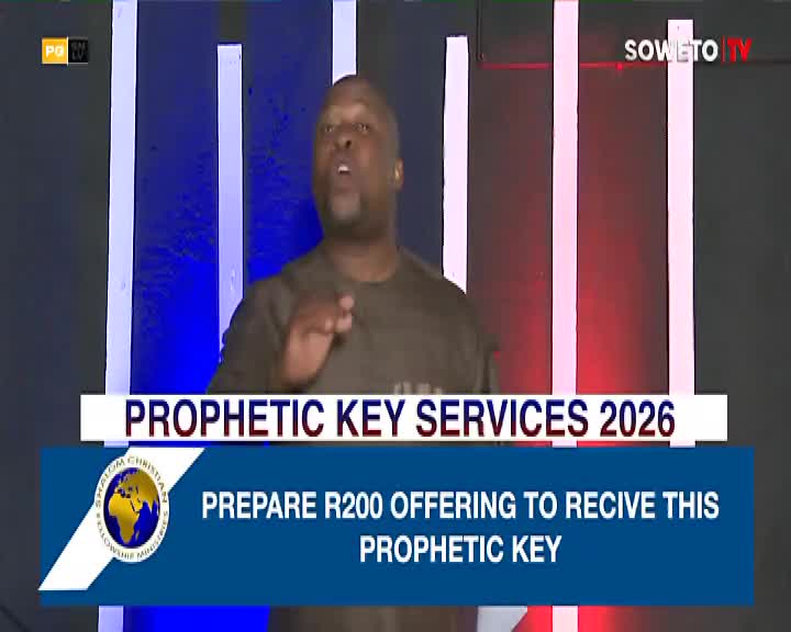A man stands before a backdrop of vertical blue and white bars, speaking with his right hand raised. A banner across the bottom of the screen announces "PROPHETIC KEY SERVICES 2026" and instructs viewers to "PREPARE R200 OFFERING TO RECIVE THIS PROPHETIC KEY."