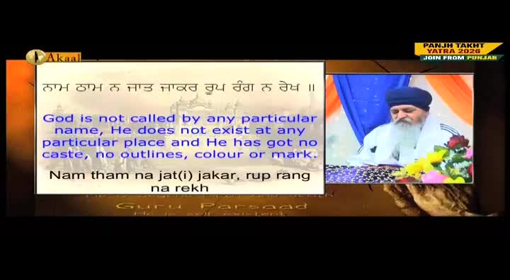 A man with a long white beard and a turban sits in front of a bouquet of flowers, speaking on the Akaal Channel. Text in both Punjabi and English is displayed on the screen.
