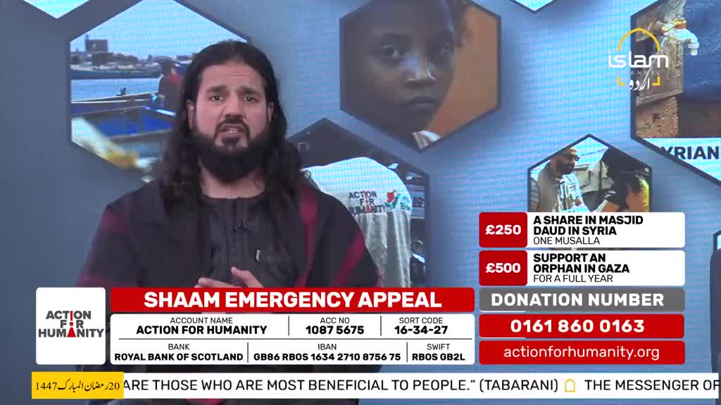A man with a beard and long, dark hair speaks directly to the camera, gesturing with his hands. Behind him, a screen displays images of children and information for a "Shaam Emergency Appeal" from Action for Humanity.