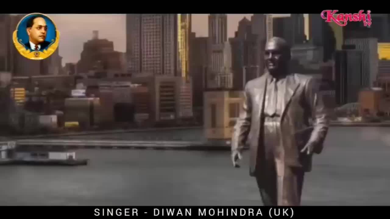 A bronze statue strides forward against a backdrop of city buildings. The Kanshi TV logo appears in the upper right corner.