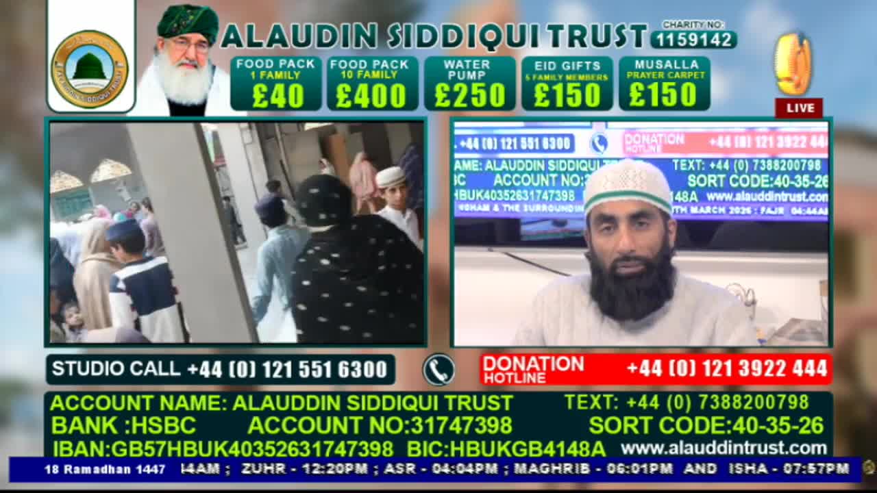 A crowd mills about outside a building, some individuals wearing kufis and others headscarves. On a screen, a man with a beard and a white kufi speaks directly to the camera.