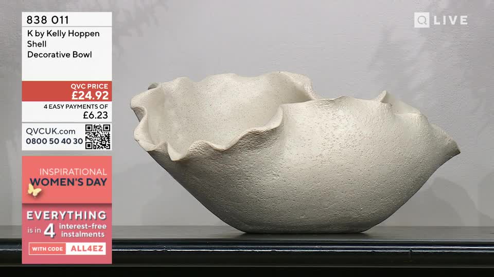The K by Kelly Hoppen decorative bowl, with its textured, shell-like rim, sits on a dark surface. On the left, a graphic displays the QVC price of £24.92, with an option for four easy payments of £6.23. The K by Kelly Hoppen decorative bowl, with its textured, shell-like rim, sits on a dark surface. On the left, a graphic displays the QVC price of £24.92, with an option for four easy payments of £6.23.