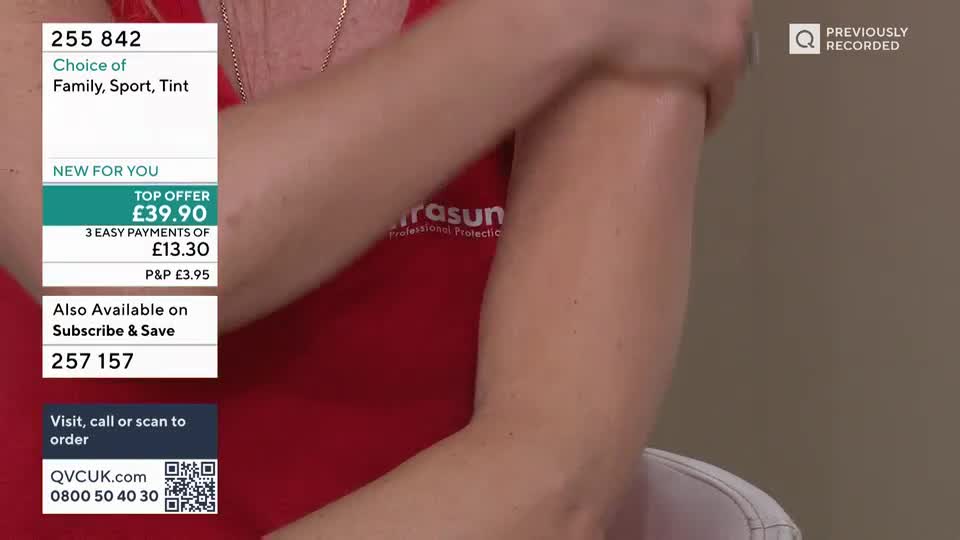 A hand glides down an arm, smoothing something onto the skin. A red t-shirt with "rasun Professional Protection" printed on it is visible.