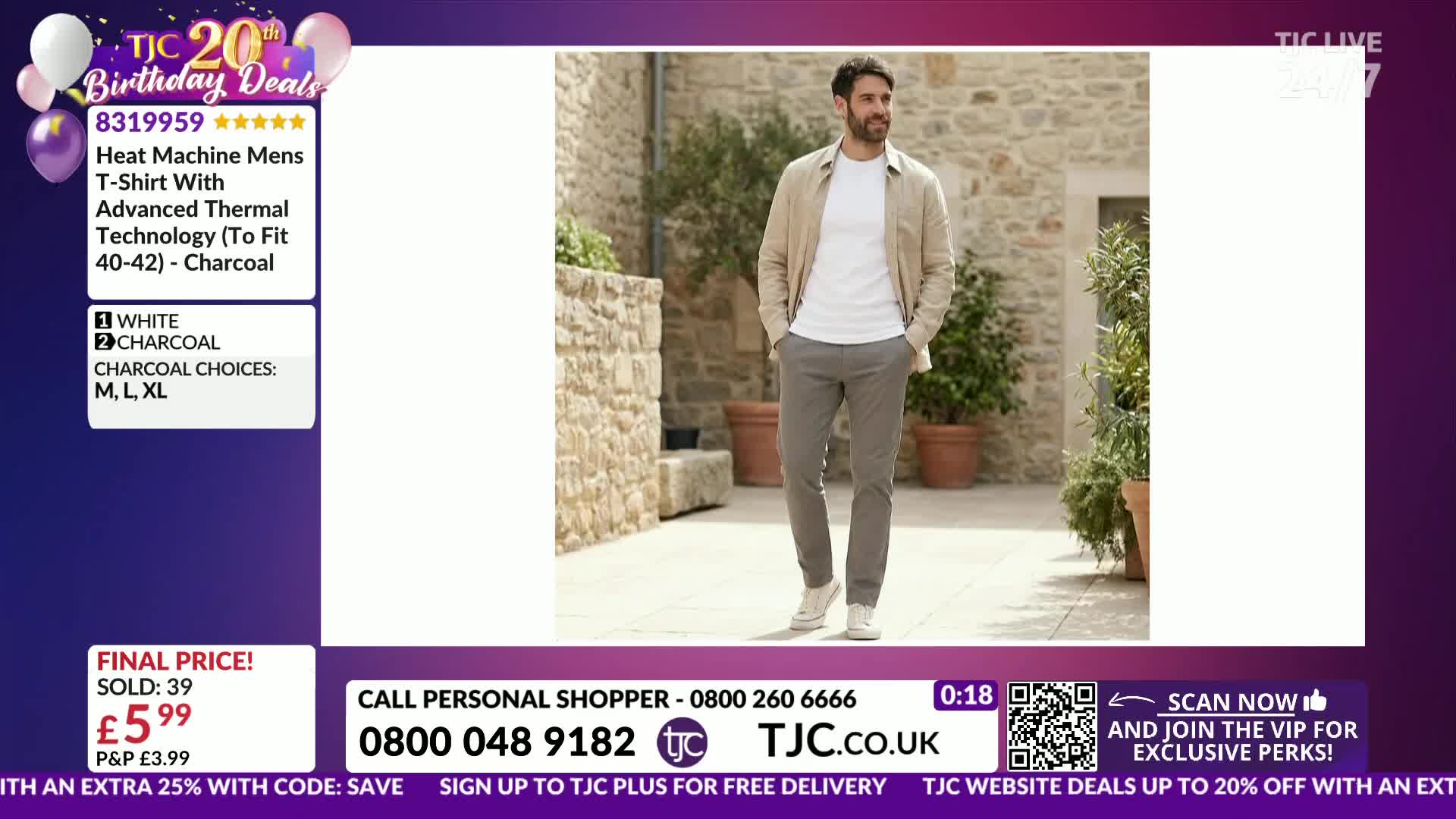A man walks along a stone path, hands in his pockets, wearing a light jacket over a white t-shirt and grey trousers. The TJC logo and product details are displayed on the left.