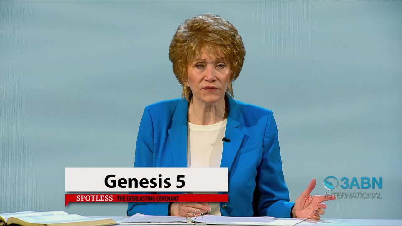 A woman in a blue blazer speaks, her right hand gesturing. A graphic displays "Genesis 5" and the 3ABN International logo.