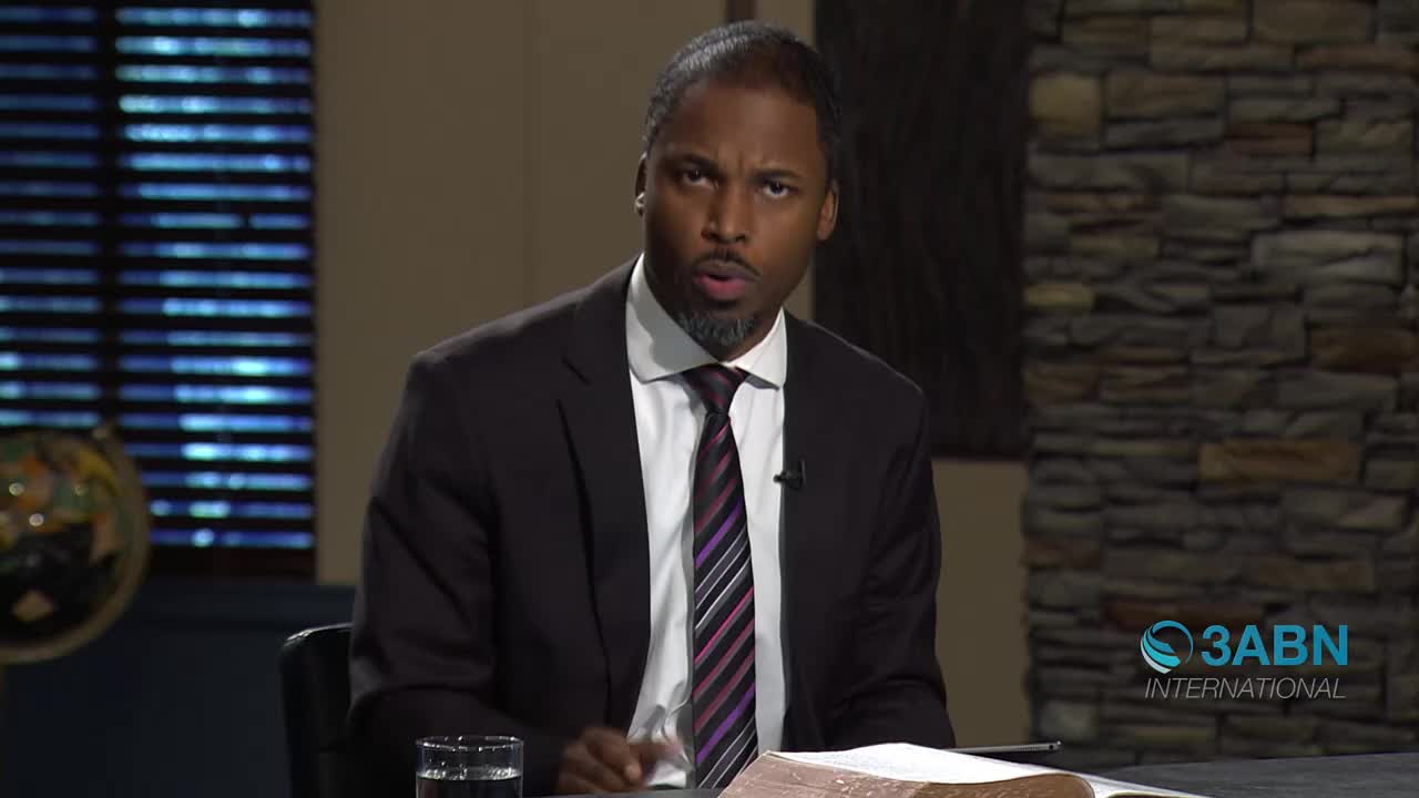 A man in a suit speaks directly to the camera, a Bible open before him. The 3ABN International logo is visible in the background.