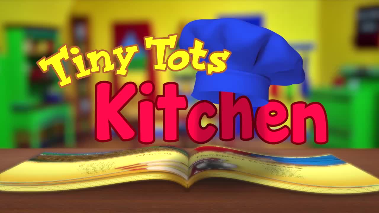 The title "Tiny Tots Kitchen" sits above an open cookbook. A cartoon chef's hat hovers above the word "Kitchen" in a kitchen setting.
