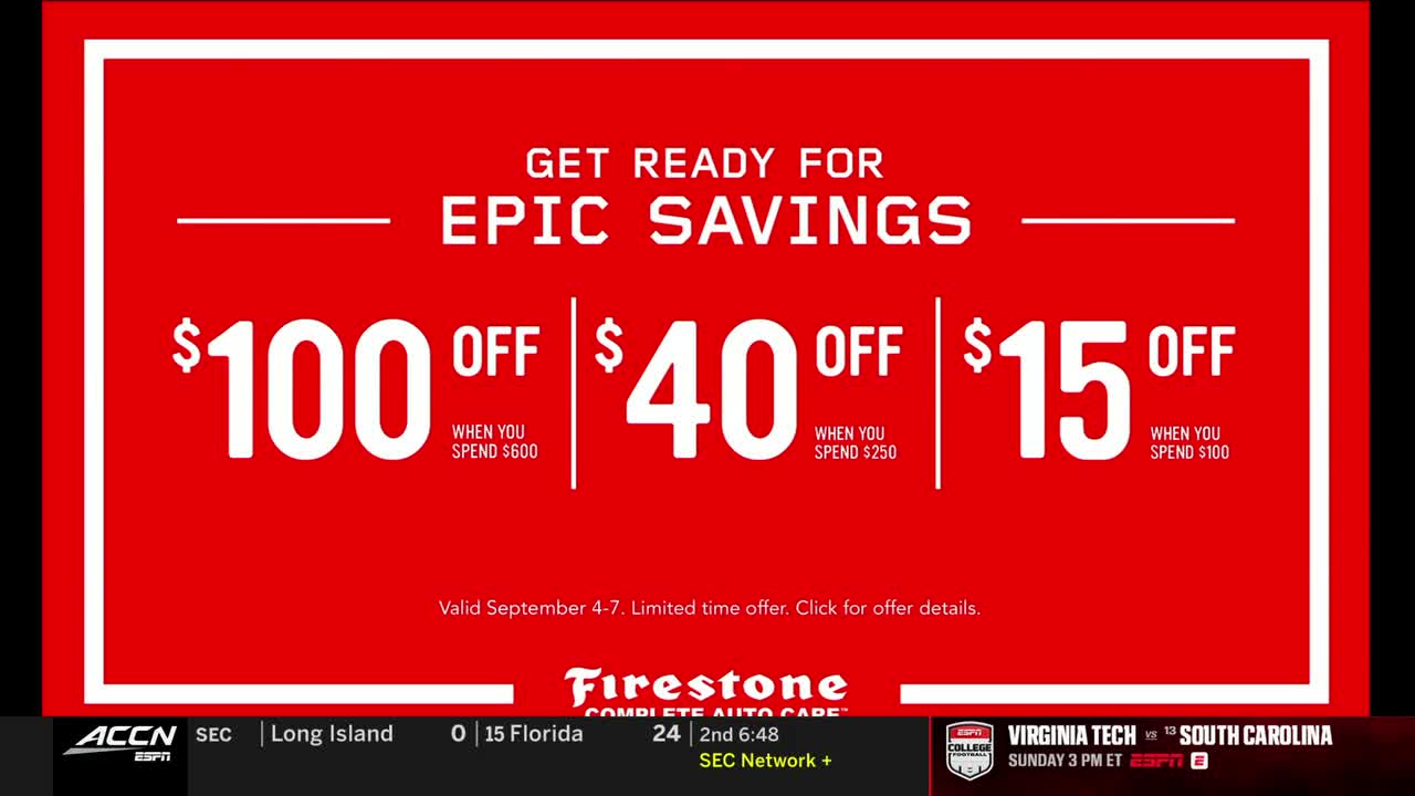 A red graphic with white text advertises Firestone discounts on the ACC Network. The screen shows savings of up to $100 off purchases.
