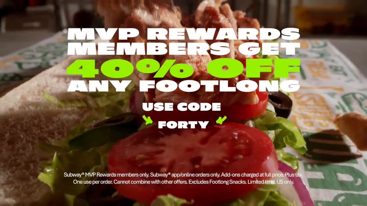 A Subway footlong sandwich, filled with tomatoes, lettuce, and other ingredients, is front and center. Bold text flashes the offer: "40% OFF ANY FOOTLONG."
