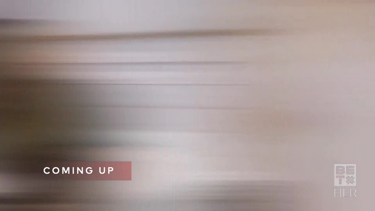 The screen is a wash of horizontal streaks, mostly in shades of beige and gray. A small box with "COMING UP" appears, and the BET Her logo is in the corner.
