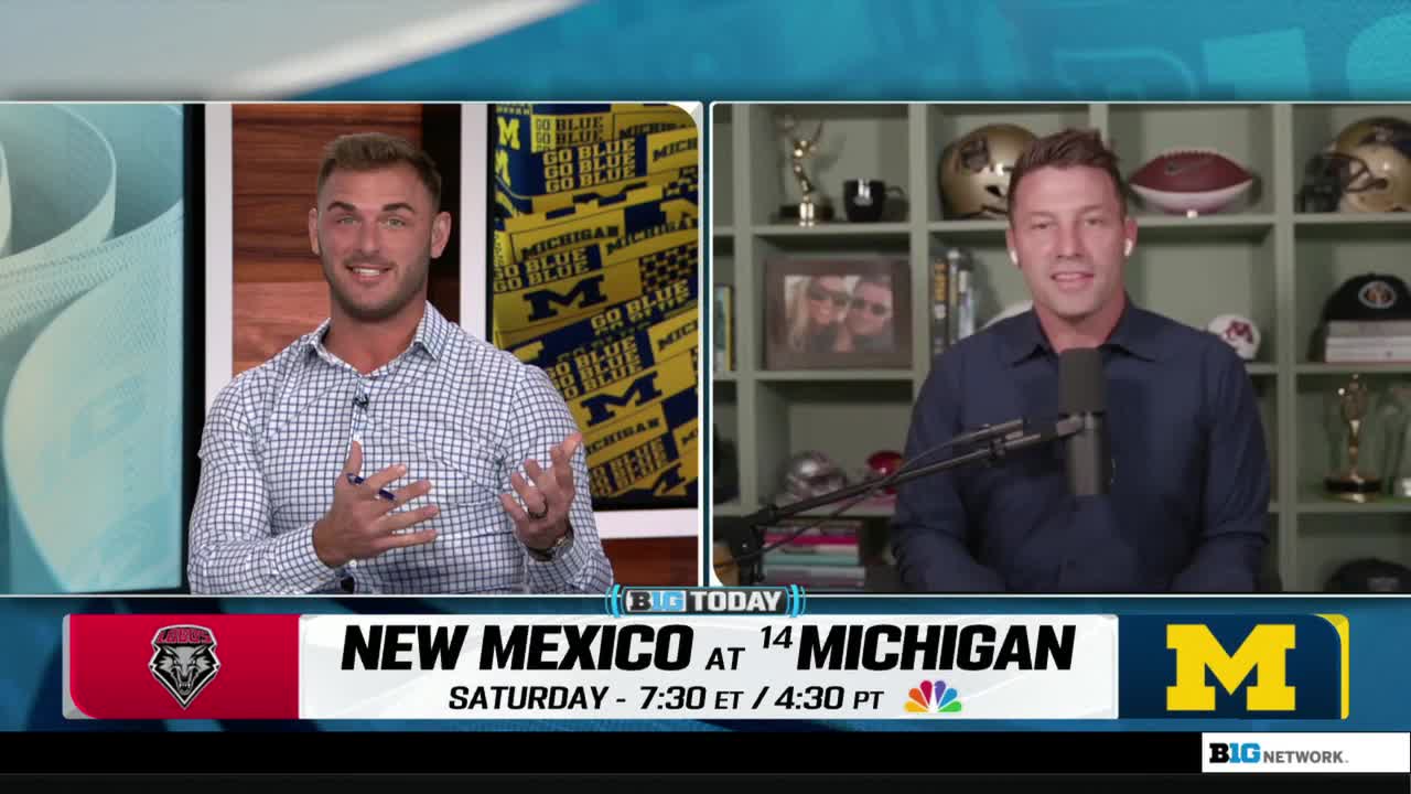 Two men are seated at desks, speaking into microphones. The Big Ten Network's "BTN Today" graphic displays the upcoming New Mexico at Michigan game.
