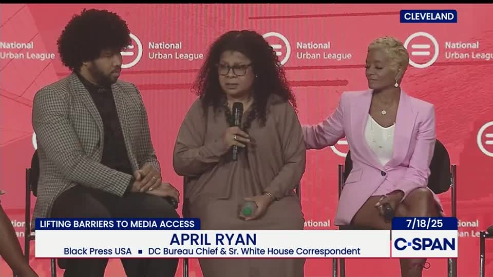 April Ryan speaks into a microphone, while the other two panelists listen intently. A C-SPAN graphic identifies the event as being in Cleveland, Ohio.
