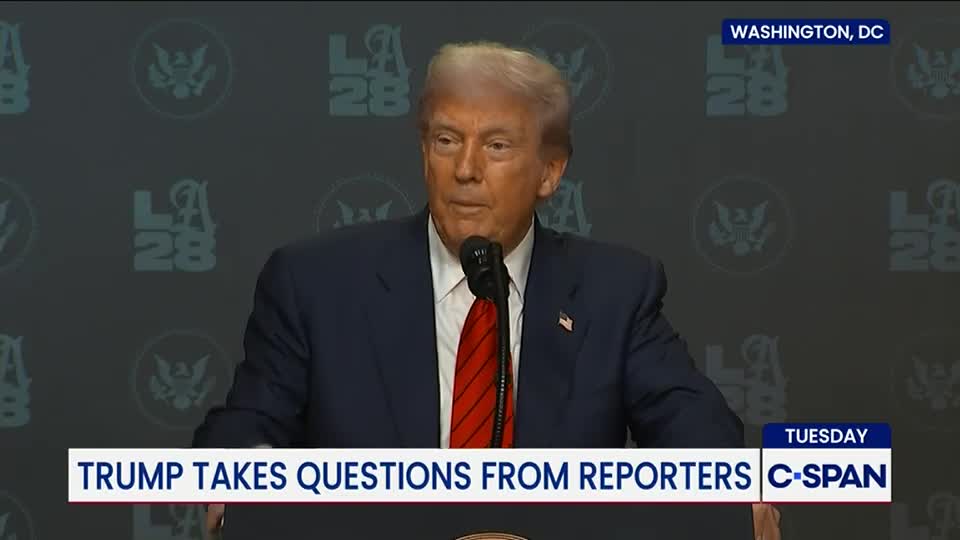Standing at the podium, the former United States president addresses reporters, a red tie prominent against his dark suit. C-SPAN is broadcasting live from Washington, D.C., as the scene unfolds.
