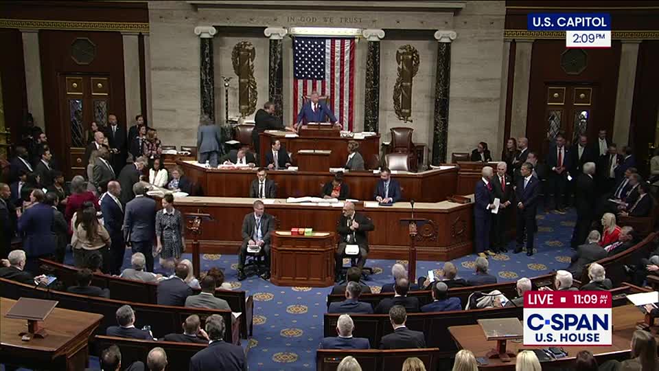 The Speaker is at the podium, addressing the chamber, while many representatives mill about on the floor. C-SPAN's live feed broadcasts the scene from the U.S. House.
