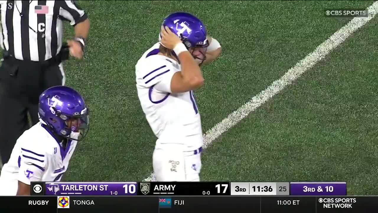 A player in a purple helmet and white uniform is holding his head, looking down the field. The score shows Tarleton State trailing Army on CBS Sports Network USA.
