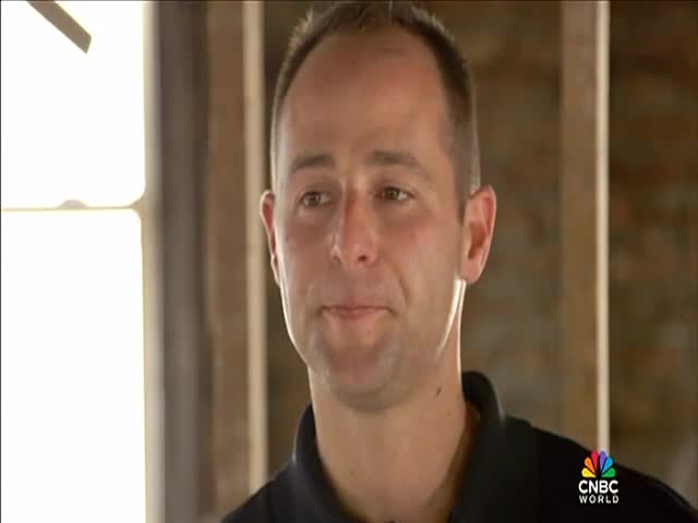 A man in a black shirt is speaking, his expression calm. The CNBC World logo is visible in the corner.
