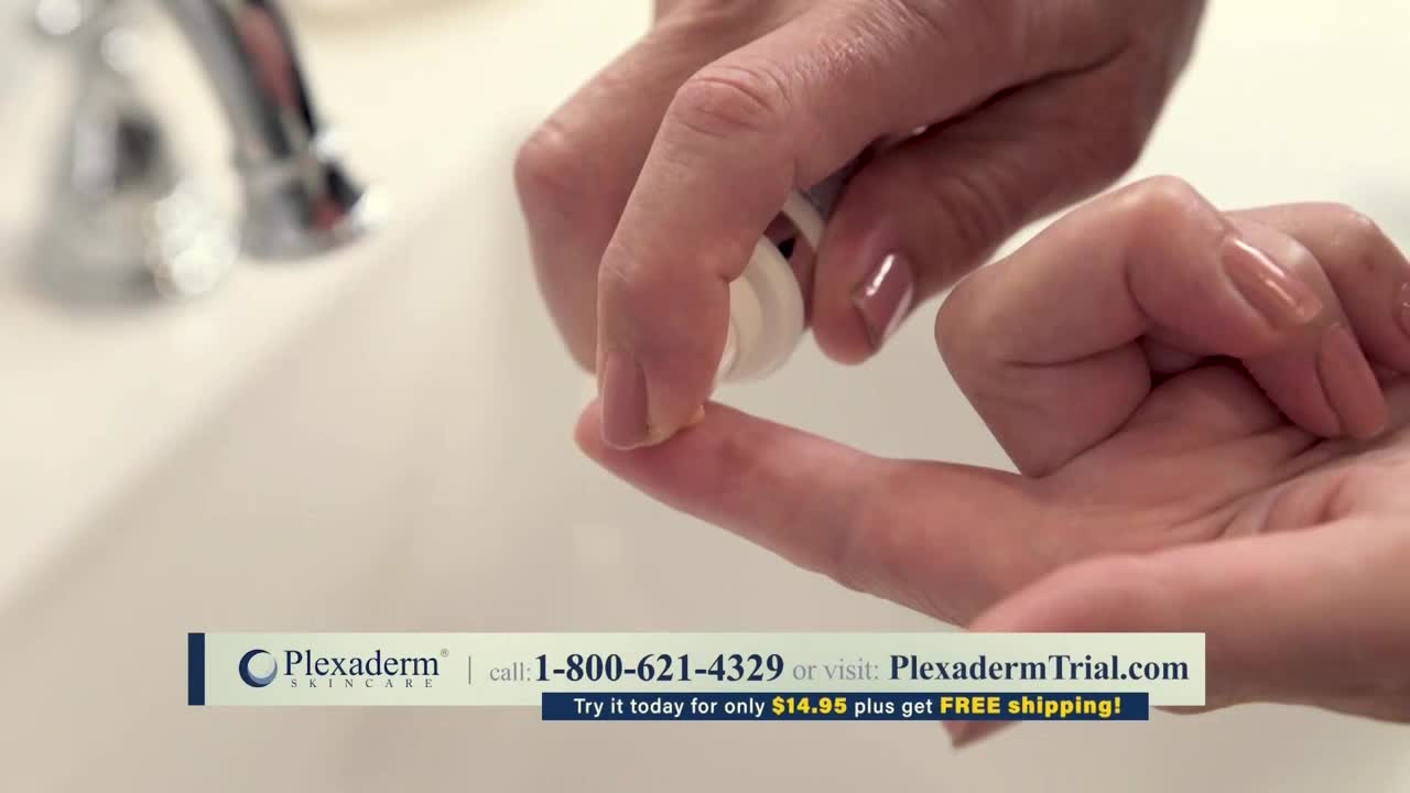 A finger presses a white applicator against another finger, dispensing a small amount of product. The scene appears to be from a commercial on Comedy Central, advertising a skincare product.

