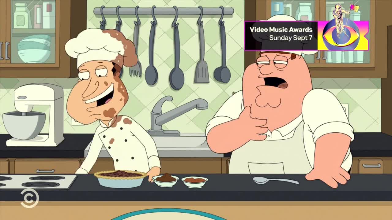 One chef, covered in chocolate, grins over a pie while the other looks shocked. A Comedy Central logo sits at the bottom of the screen.
