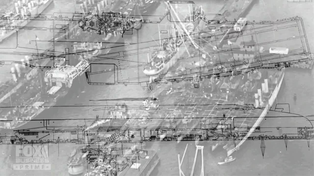 Overlaid on an aerial view of a naval ship, a blueprint of the vessel's design floats. The Fox Business Network logo sits in the lower-left corner.
