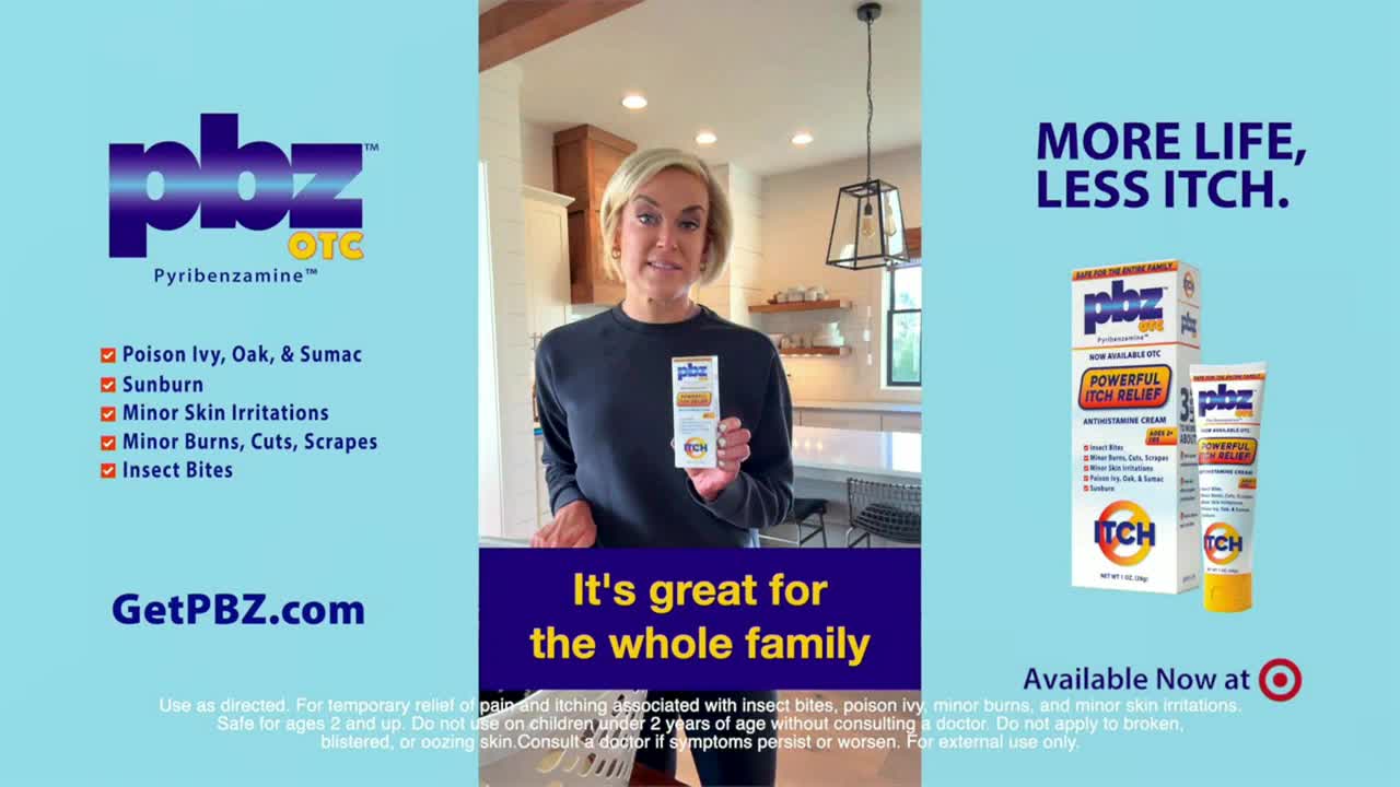 A woman in a dark sweater stands in a kitchen, holding a box of PBZ itch relief. The commercial, likely on Fox Business Network in the United States, promotes the product with the tagline "More Life, Less Itch."
