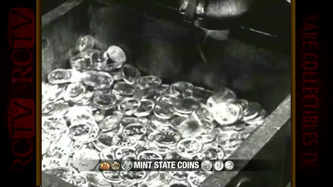 Shiny coins tumble into a bin, catching the light as they fall. The Fox Business Network is showing a segment on "Mint State Coins" from the United States.
