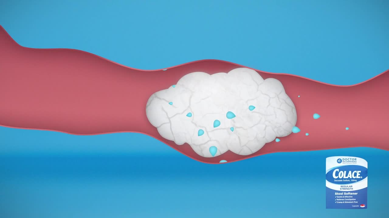 A large, white mass is inside a red tube, with small blue droplets scattered around it.  The scene appears to be an advertisement for a stool softener.
