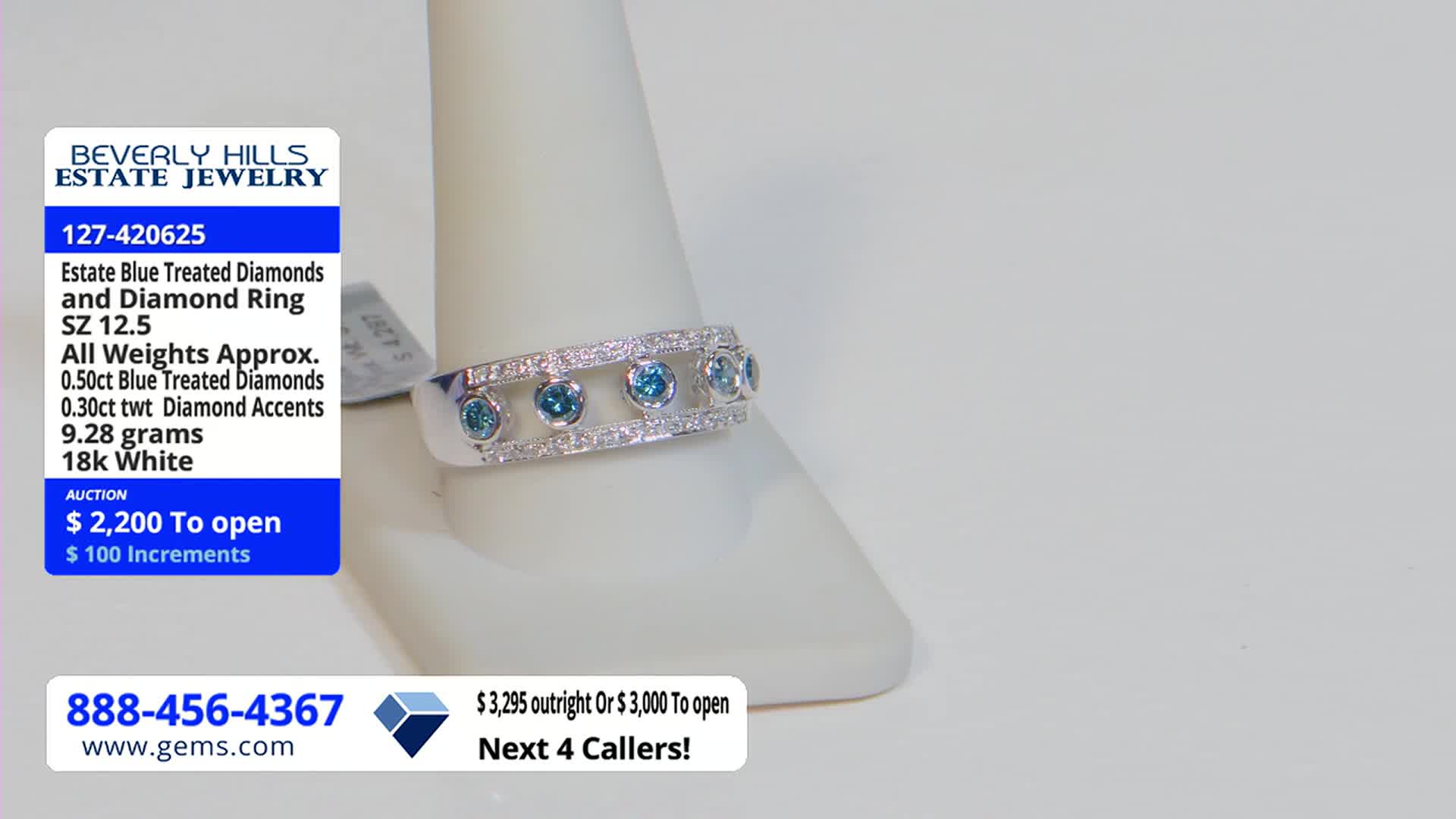 A ring with blue diamonds is displayed on a white stand, with a price tag from Beverly Hills Estate Jewelry visible. The Gem Shopping Network's phone number and website are shown at the bottom of the screen.
