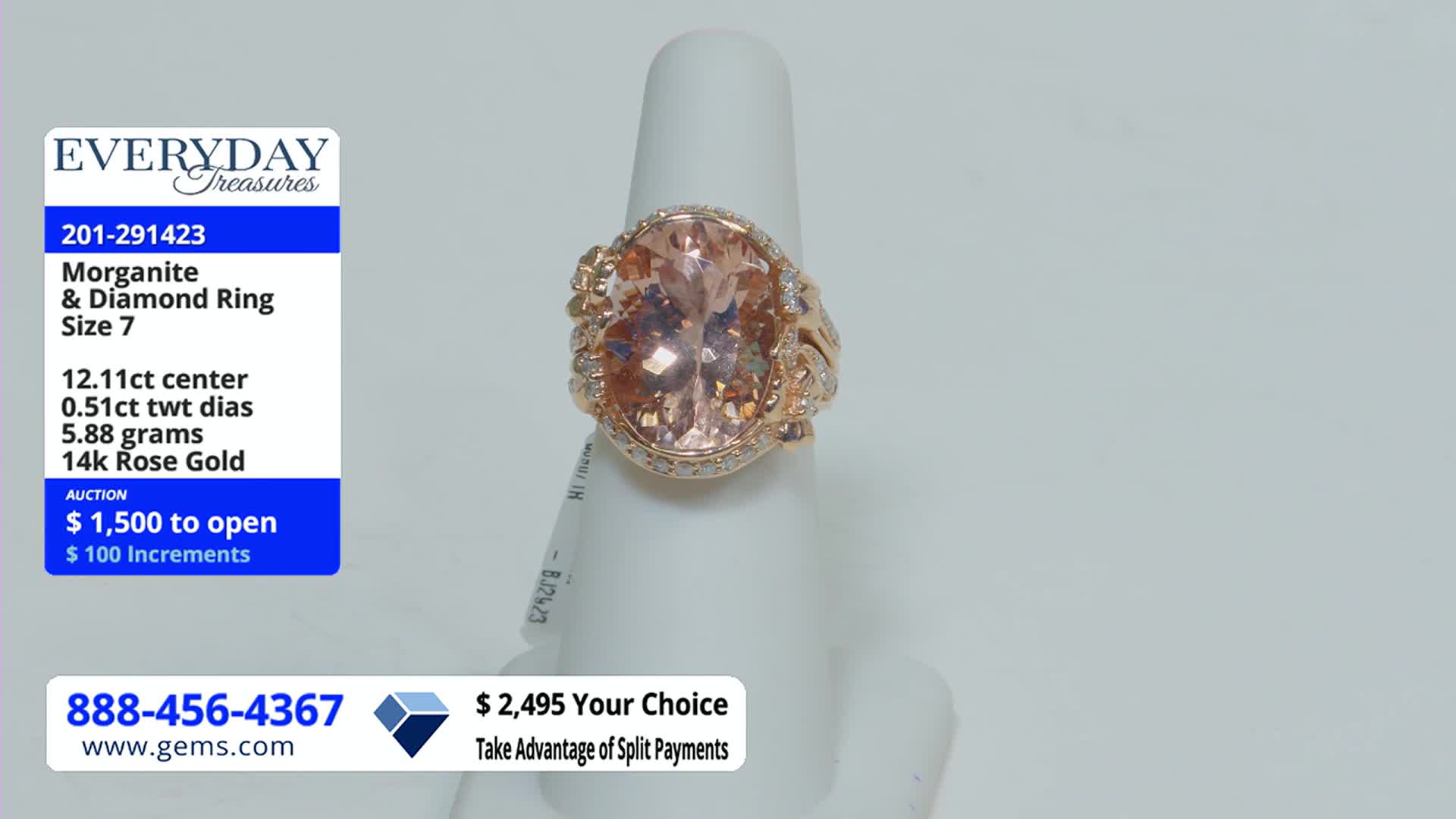 A large, oval morganite ring sits on a white display stand. The Gem Shopping Network is offering it at auction, starting at $1,500.
