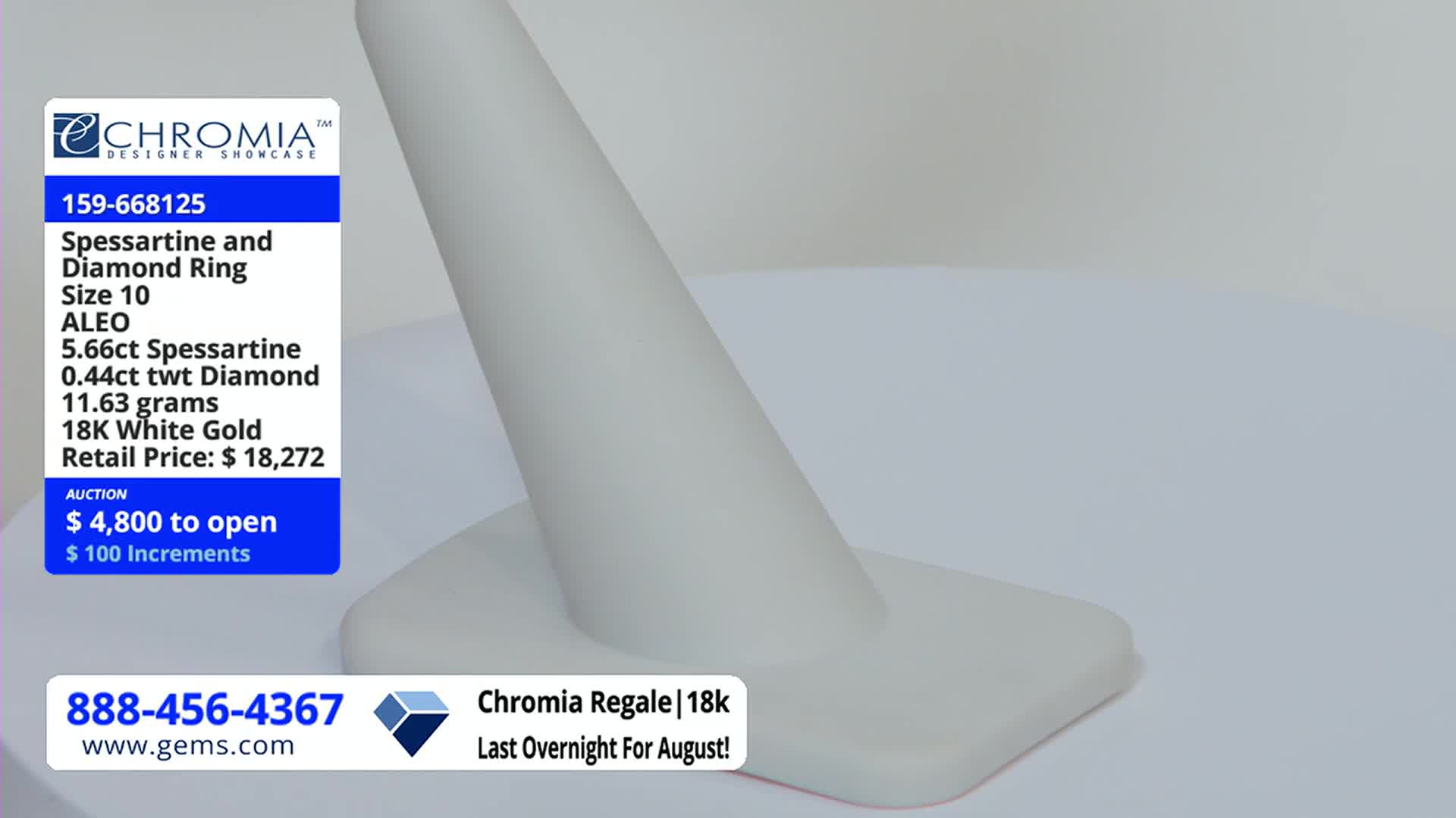 A white ring display sits centered, with a price tag for a gem ring visible on the left. The Gem Shopping Network is advertising a Spessartine and Diamond Ring for auction.
