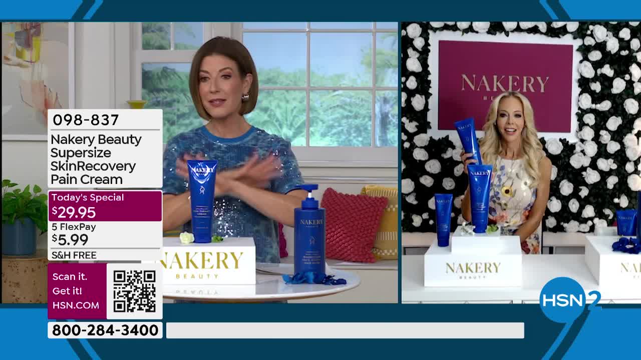 A woman on HSN2 holds up several blue tubes of Nakery Beauty Supersize SkinRecovery Pain Cream. Another woman gestures enthusiastically while a large pump bottle of the same cream sits on a display.