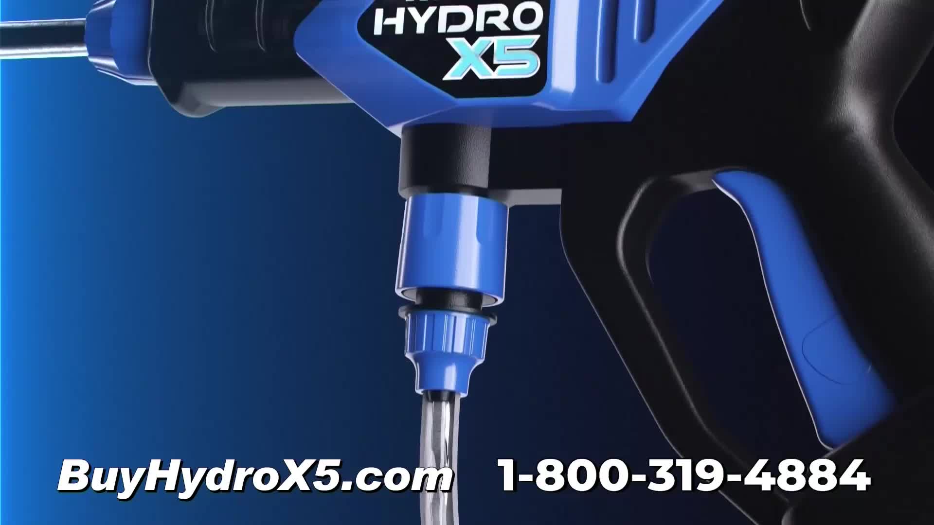 A blue and black Hydro X5 pressure washer is angled towards the viewer. Water streams steadily from a clear tube connected to the device.
