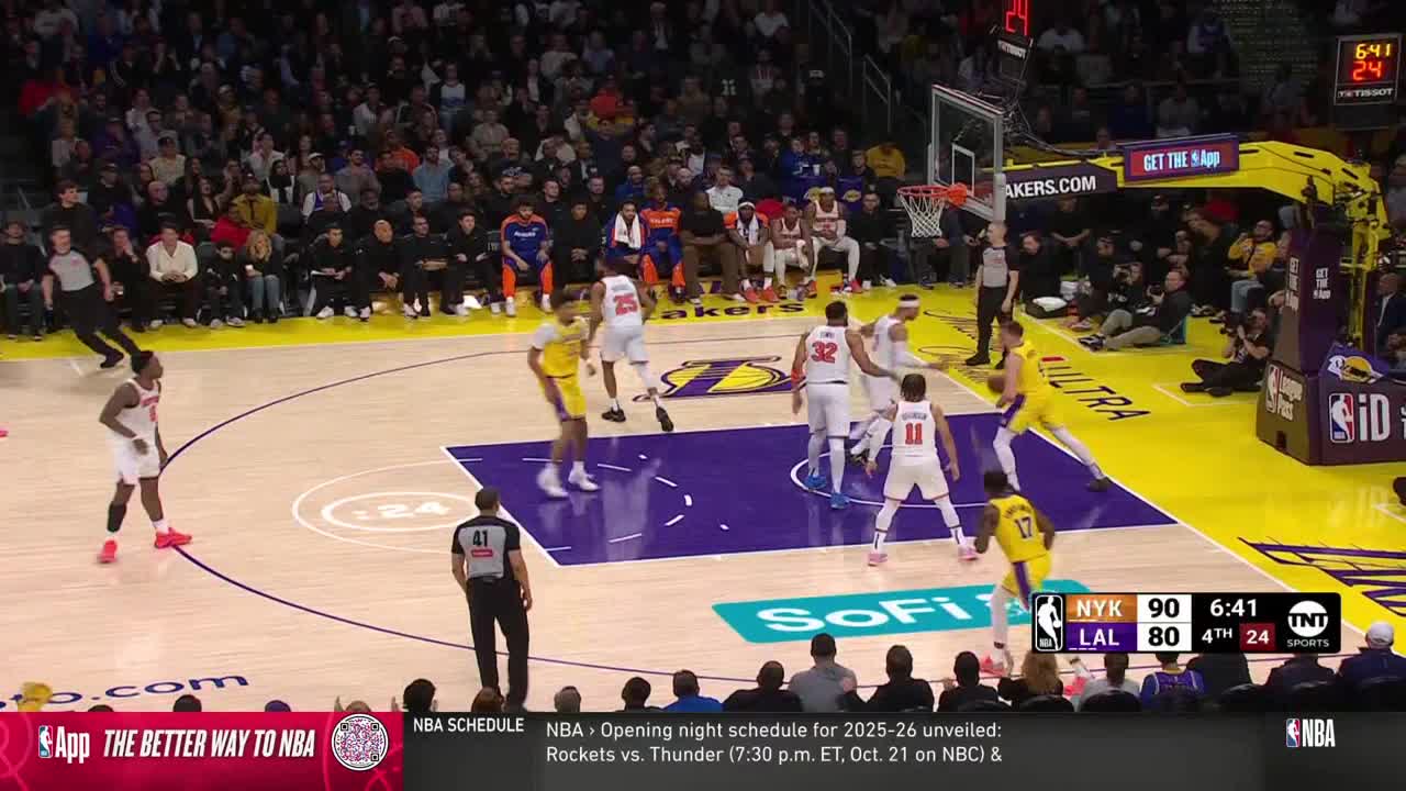 The Lakers are on offense, with a player in yellow dribbling toward the basket. The Knicks' defense is set, and a referee watches the play closely.
