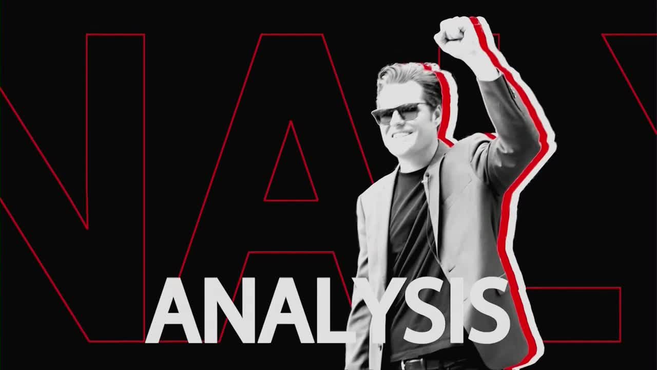 A man in a suit and sunglasses raises his fist in a gesture of triumph. The word "ANALYSIS" appears in large white letters across the bottom of the screen, with bold red lines framing the scene.
