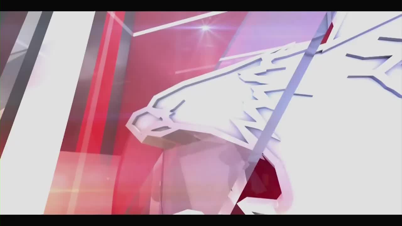 A white eagle head, a symbol of American strength, emerges from behind red and white geometric shapes. The graphic animates with sharp, angular movements, suggesting a dynamic broadcast intro.