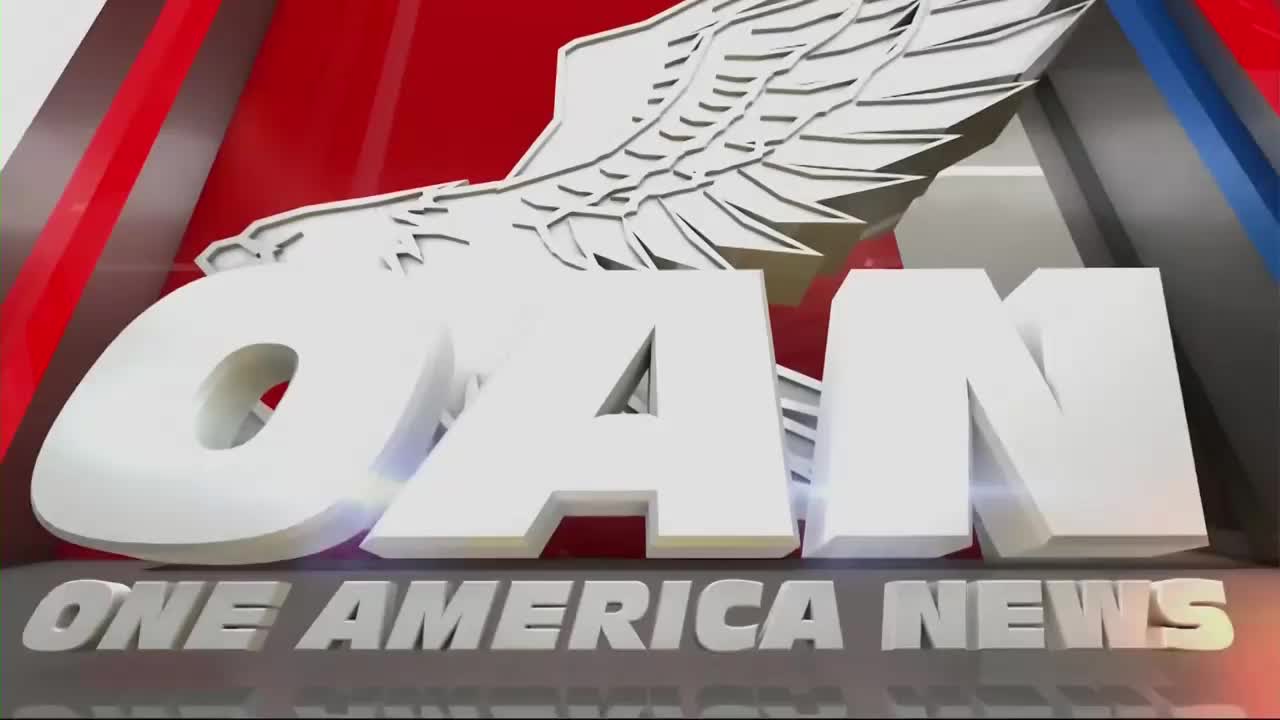 The large white letters spelling "OAN" are rotating, with an eagle's wings spread behind them. Below, "ONE AMERICA NEWS" appears in smaller, metallic letters.
