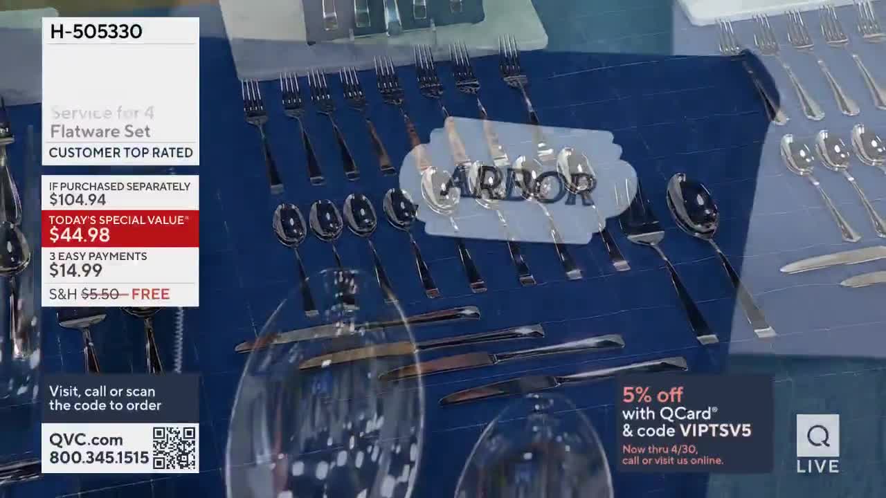 Rows of polished forks and spoons are laid out on a blue cloth. A white tag with "ARBOR" printed on it sits above a group of spoons.